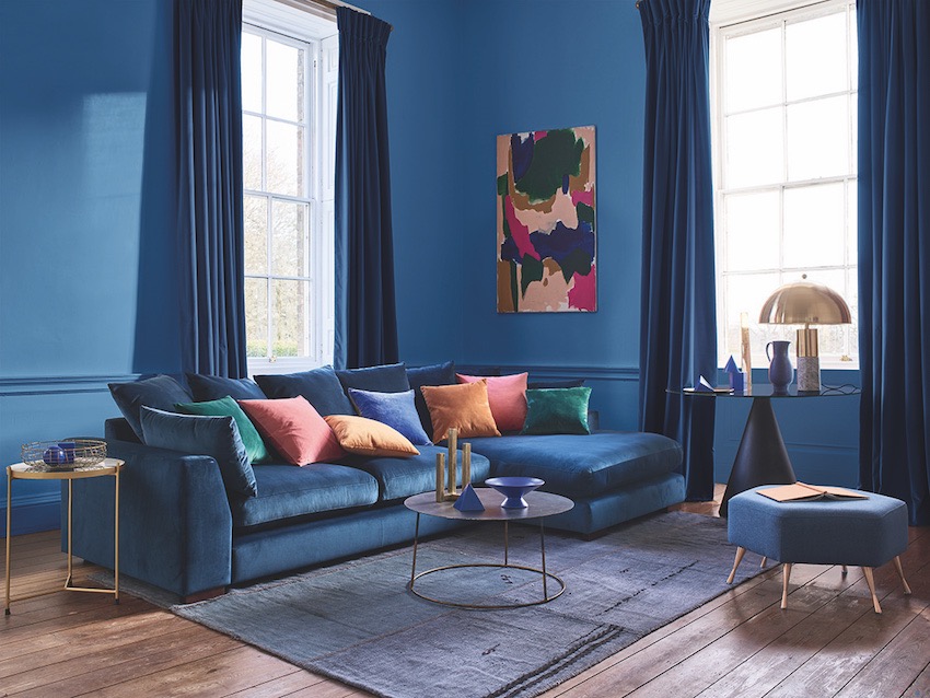 9 Perfect Pairings - Living Room Trends with DFS - Summer 2020 - DFS Plush Large Chaise Sofa in dark blue velvet and Play footstool in weave