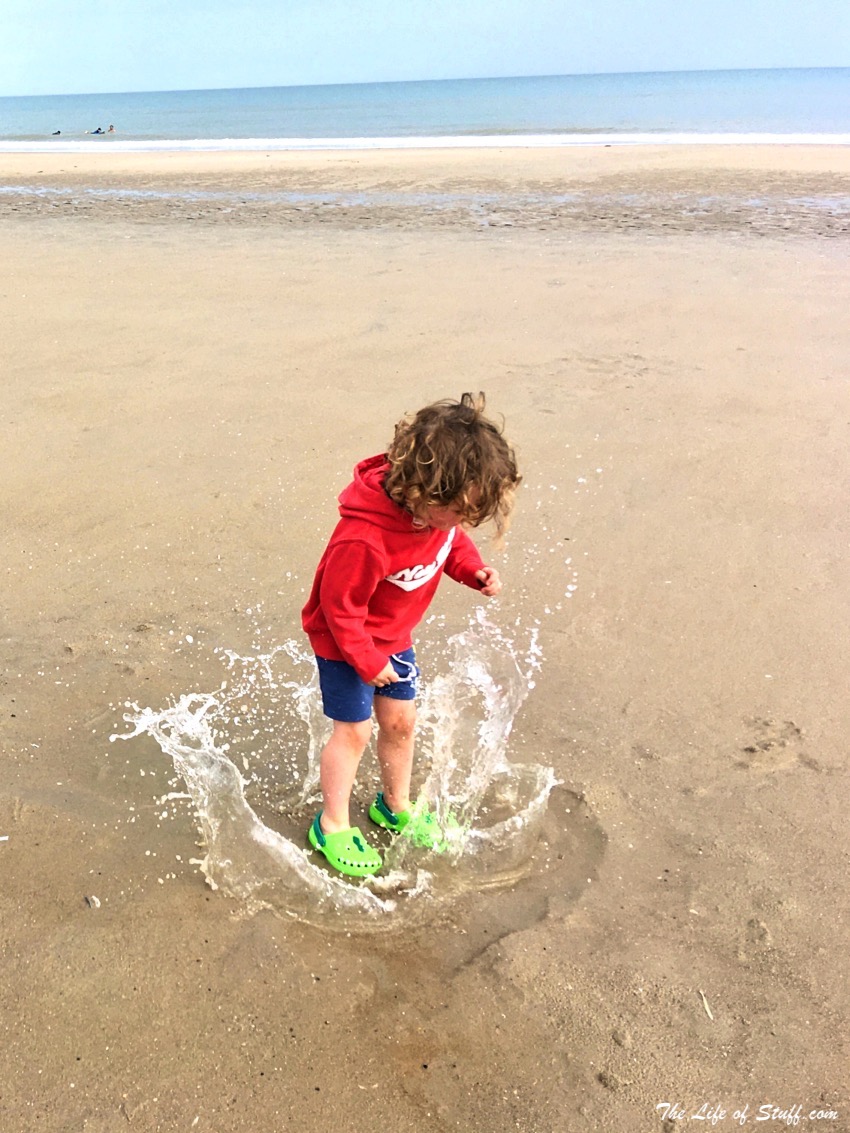 Captivated by Curracloe Beach in Co. Wexford - Splashing in Puddles