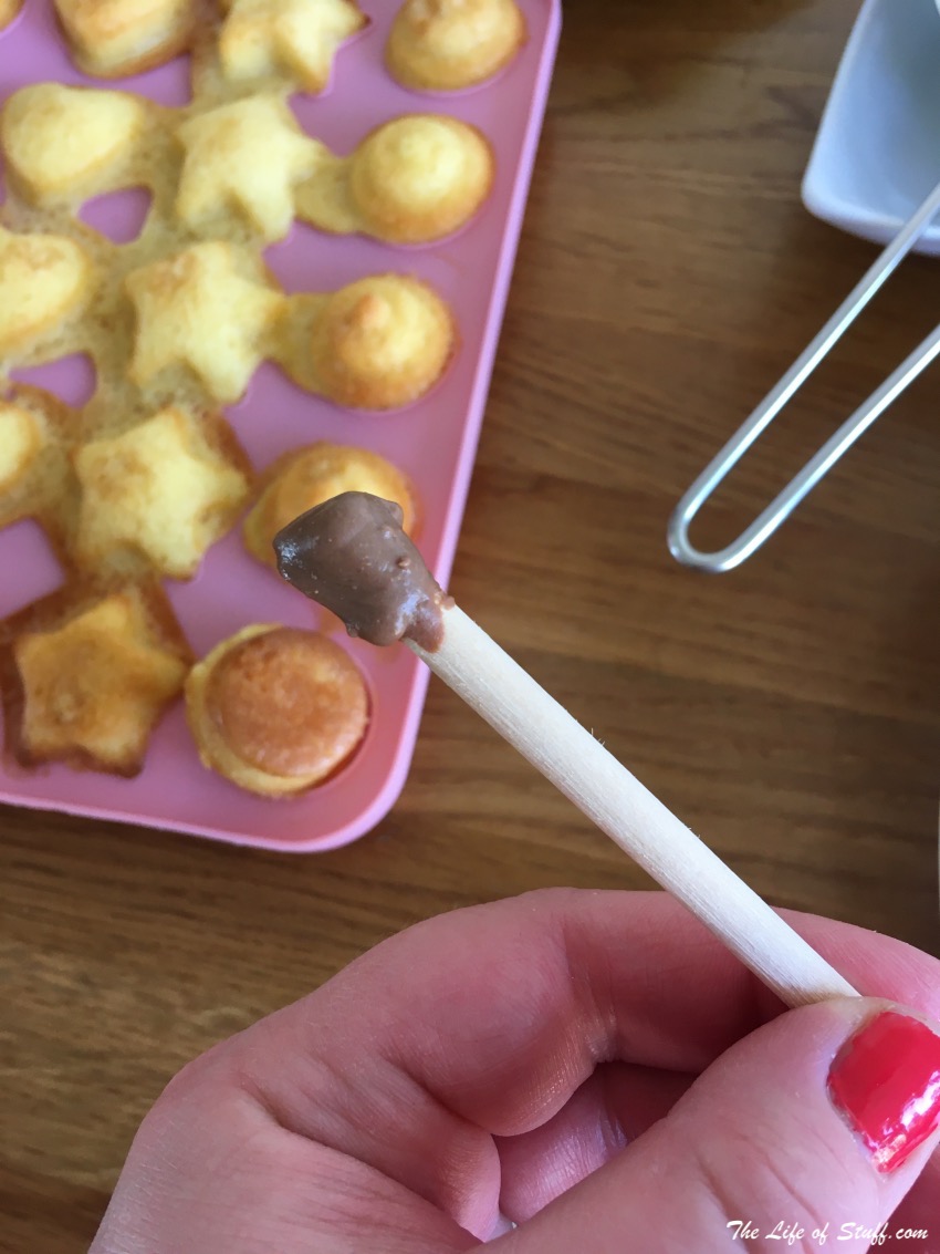 Baking with Kids - Super Simple Cake Pops Recipe - add the stick to cake pop