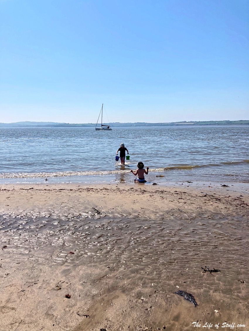 Duncannon Beach, A Family-Friendly Drive-On Beach in Wexford - playing in the sea