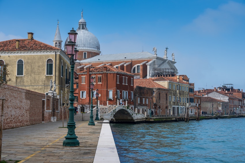 4 Must-Visit Places to Experience on a Europe Tour - Venice waterways, Italy